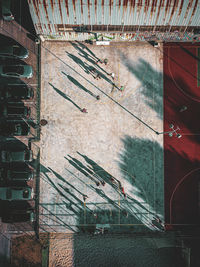 High angle view of people playing basketball in court