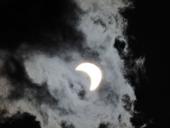 Low angle view of moon against sky at night