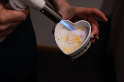 Creme brulee in heart shaped baking tin.