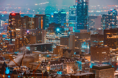 Illuminated buildings in city at night