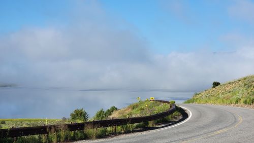 Curved road by the lake