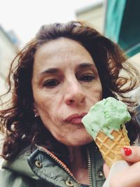 Portrait of woman with ice cream