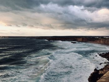 Scenic view of sea against sky during sunset