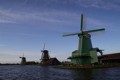 Traditional windmill against sky