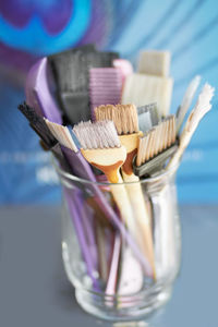 Close-up of paintbrushes on table