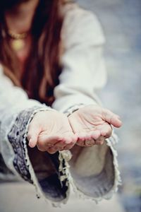 Close-up of couple holding hands
