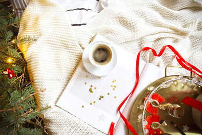 High angle view of coffee cup on table