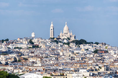Sacre coeur viewed from top of arc de triomphe. famous landmark view with montmartre neighborhood 