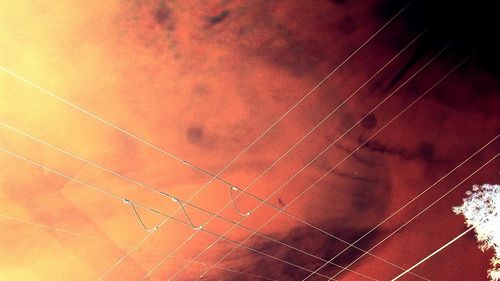 Full frame shot of spider web against sky