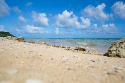 Scenic view of beach against sky