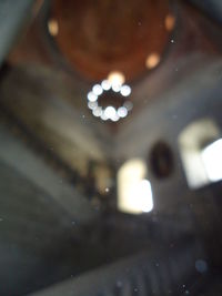 Defocused image of illuminated lights at night