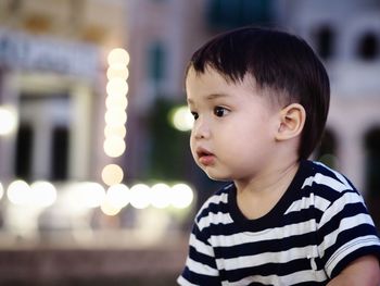 Close-up of cute baby at night