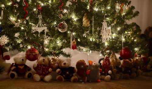 Christmas decorations hanging on tree