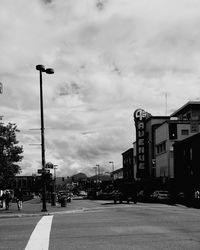 City street against cloudy sky