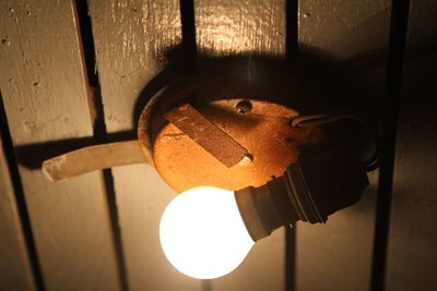 Close-up of electric light on ceiling