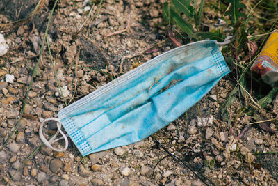 High angle view of blue umbrella on field