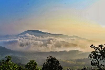 Scenic view of mountains against sky during sunset