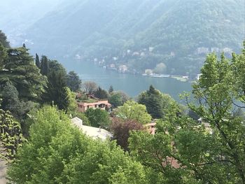 High angle view of townscape by mountain