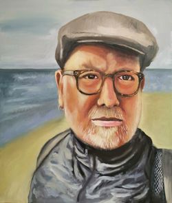 Portrait of man wearing eyeglasses