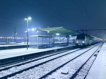 Railroad station during winter at night