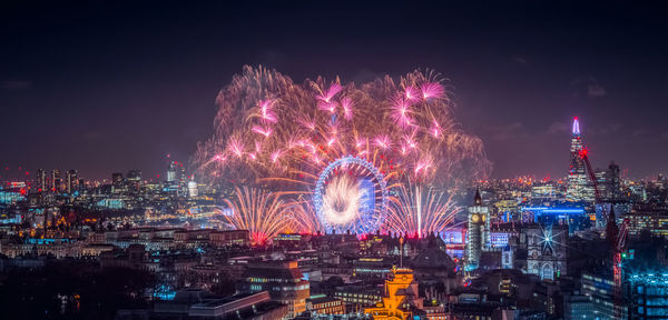High angle view of illuminated city at night