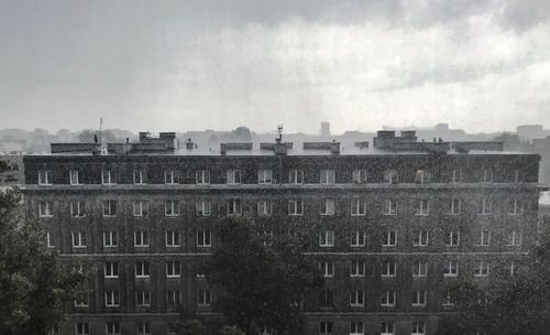 View of building against cloudy sky