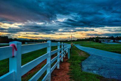 Scenic view of field against sky during sunset