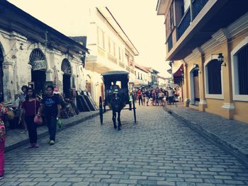 People on street in city