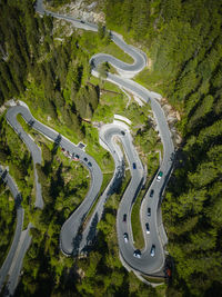 Aerial image of cars on maloja mountain pass road, engadin, switzerland