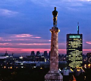 City lit up at dusk