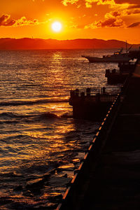 Scenic view of sea against sky during sunset