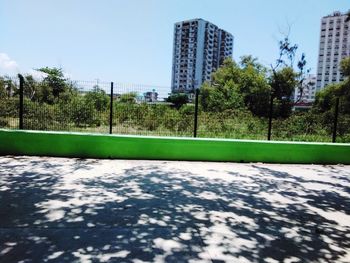 View of park with buildings in background