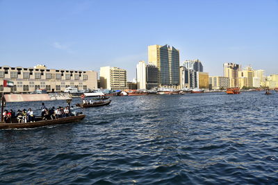 Dubai skyline from dubai creek harbour and dubai canal to downtown and business bay, uae