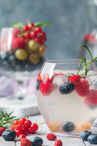 Close-up of strawberries on glass table