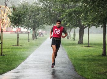 Full length of woman standing on grass