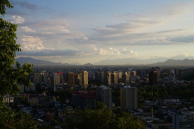 High angle view of city at sunset