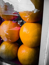 Close-up of orange fruits for sale in market