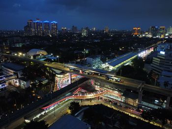 High angle view of illuminated city at night