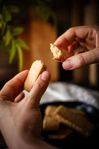 Close-up of hand holding ice cream