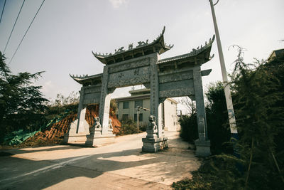 Entrance of historic building against sky