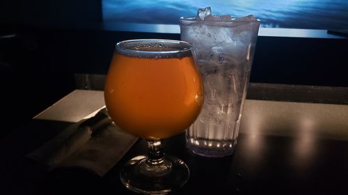 Close-up of beer glass on table