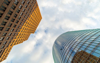 Low angle view of modern buildings against sky