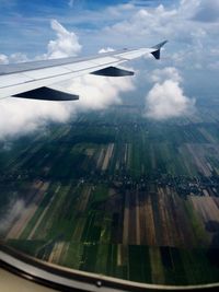 Aerial view of landscape with mountain range in background