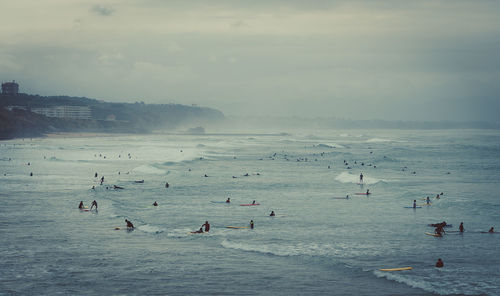 People enjoying in sea