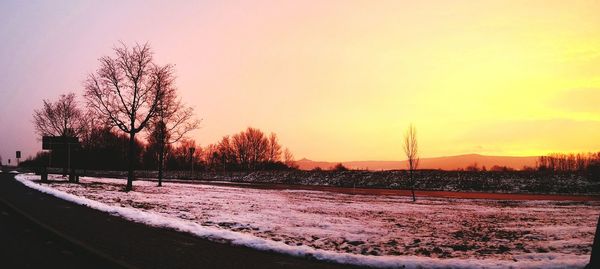 Scenic view of landscape at sunset