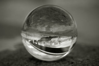 Close-up of crystal ball on table