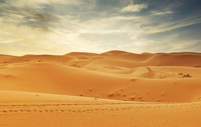 Scenic view of desert against sky