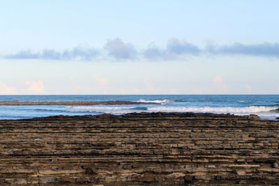 Scenic view of beach against sky