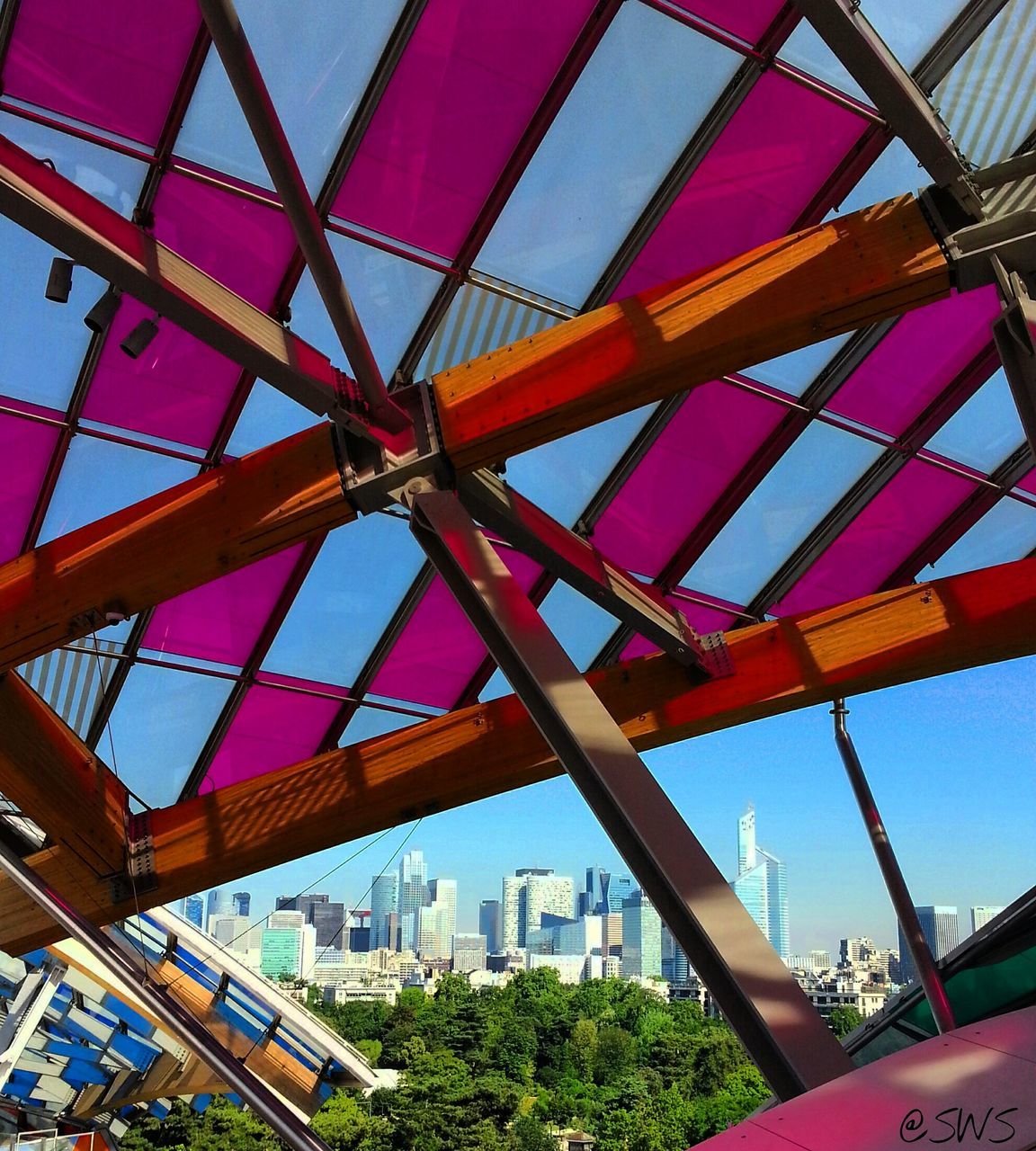 built structure, low angle view, architecture, metallic, sky, day, engineering, no people, outdoors, part of, tilt, architectural feature, blue, multi colored, growth, nature