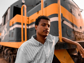 Portrait of young man looking away